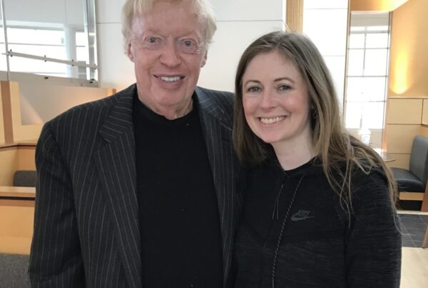 A man and woman posing for the camera.